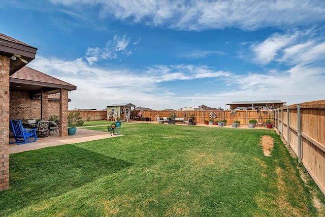 1210 S County Rd 1117, Midland, TX 79706 - view of yard featuring a patio area and an outbuilding