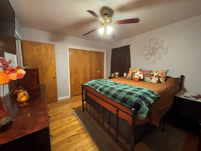 1806 38th St, Snyder, TX 79549 - bedroom with light wood-style floors, a closet, ceiling fan, and baseboards