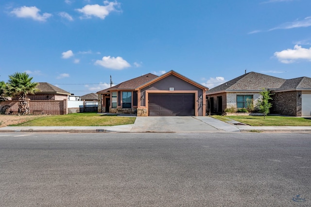 1321 Pine Ave, Midland, TX 79705 - single story home with concrete driveway, a garage, and stone siding