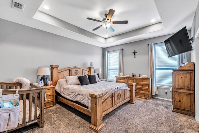 1321 Pine Ave, Midland, TX 79705 - carpeted bedroom featuring a raised ceiling, recessed lighting, and ceiling fan