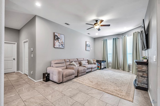 1321 Pine Ave, Midland, TX 79705 - living area with a ceiling fan and baseboards