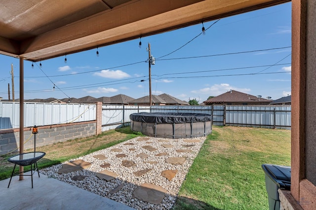 1321 Pine Ave, Midland, TX 79705 - fenced backyard with a patio