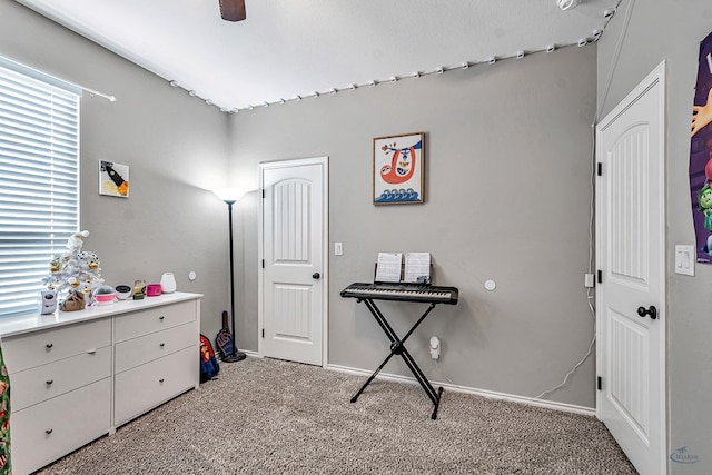 1321 Pine Ave, Midland, TX 79705 - bedroom with carpet flooring and a ceiling fan