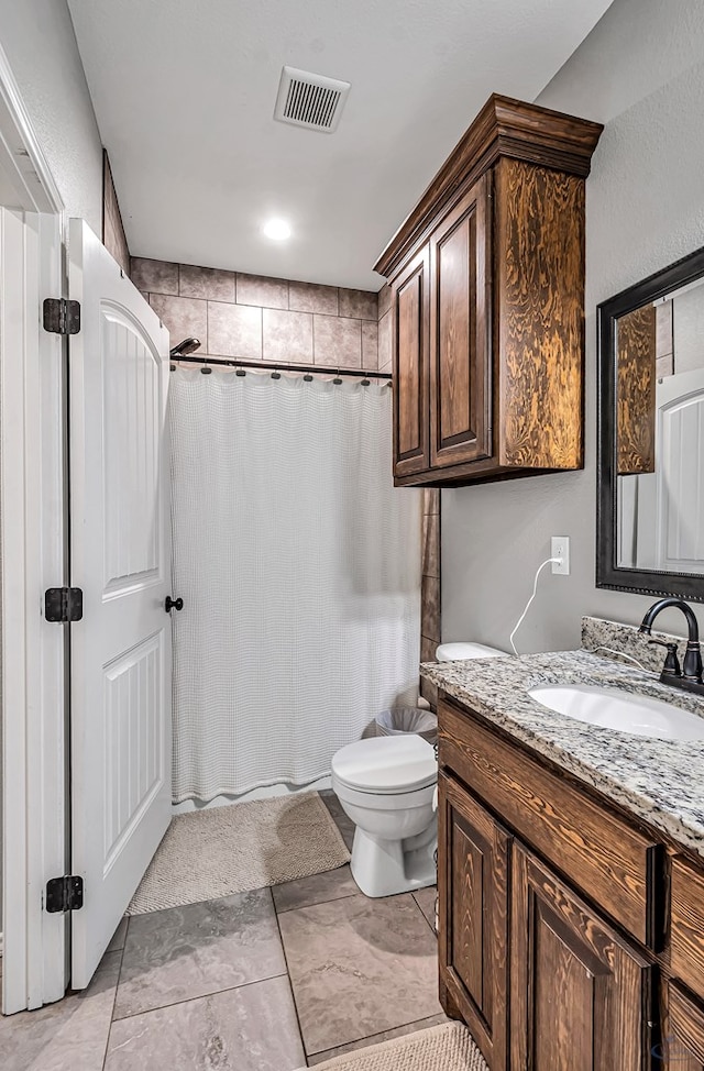 1321 Pine Ave, Midland, TX 79705 - full bathroom featuring vanity, a shower with shower curtain, and tile patterned floors