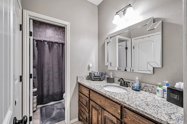 1321 Pine Ave, Midland, TX 79705 - bathroom featuring vanity and a shower with shower curtain