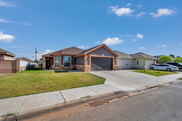 1321 Pine Ave, Midland, TX 79705 - single story home with a garage, driveway, stucco siding, and stone siding
