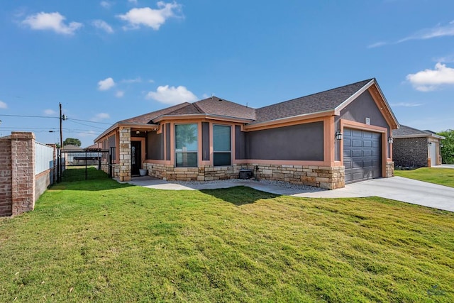 1321 Pine Ave, Midland, TX 79705 - view of front of property with a garage, stone siding, driveway, stucco siding, and a shingled roof