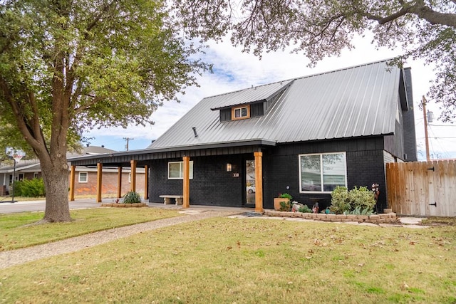 view of front of property with a front lawn