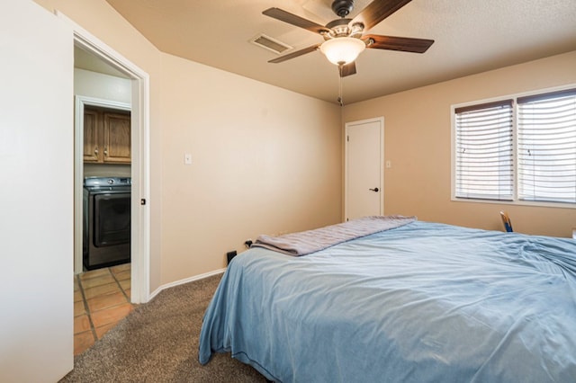 bedroom featuring washer / dryer, visible vents, baseboards, ceiling fan, and carpet