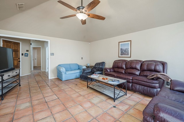 living room featuring visible vents, light tile patterned flooring, vaulted ceiling, ceiling fan, and baseboards