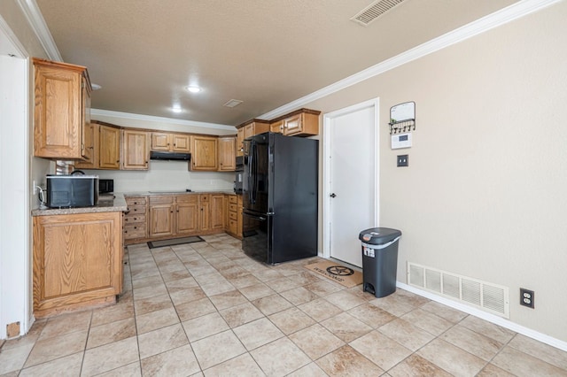 kitchen featuring crown molding, black appliances, visible vents, and under cabinet range hood