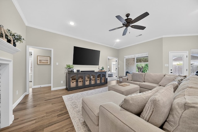 6113 Turtle Creek Rd, Midland, TX 79707 - living area with wood finished floors, a ceiling fan, crown molding, and recessed lighting