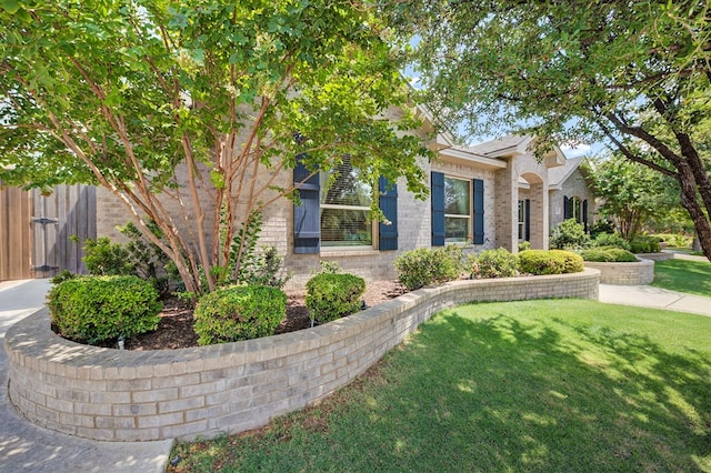 6113 Turtle Creek Rd, Midland, TX 79707 - view of property hidden behind natural elements featuring brick siding