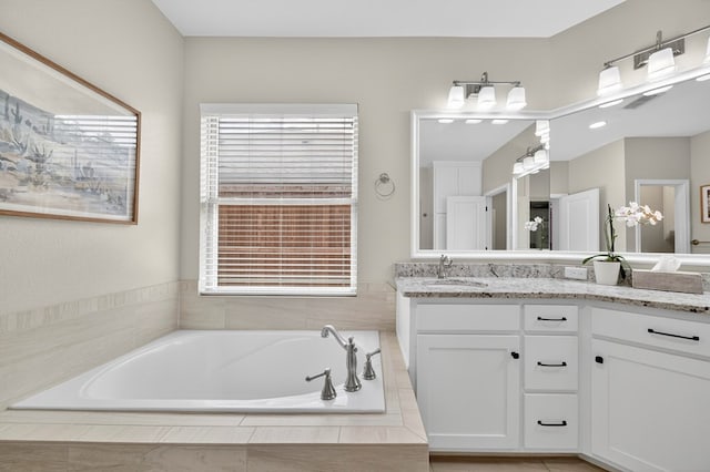 6113 Turtle Creek Rd, Midland, TX 79707 - full bath with double vanity and a garden tub