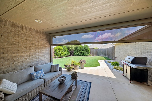 6113 Turtle Creek Rd, Midland, TX 79707 - fenced backyard featuring a patio, an outdoor hangout area, and a grill