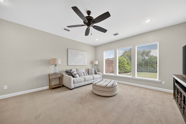 6113 Turtle Creek Rd, Midland, TX 79707 - living room featuring light colored carpet, a ceiling fan, and recessed lighting