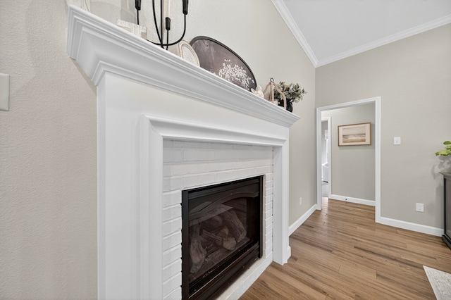 6113 Turtle Creek Rd, Midland, TX 79707 - detailed view of ornamental molding, a fireplace, and wood finished floors