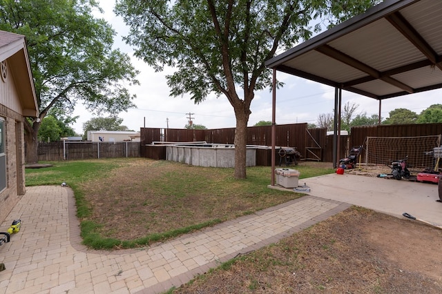 10905 E County Rd 107, Midland, TX 79706 - view of yard featuring a patio area