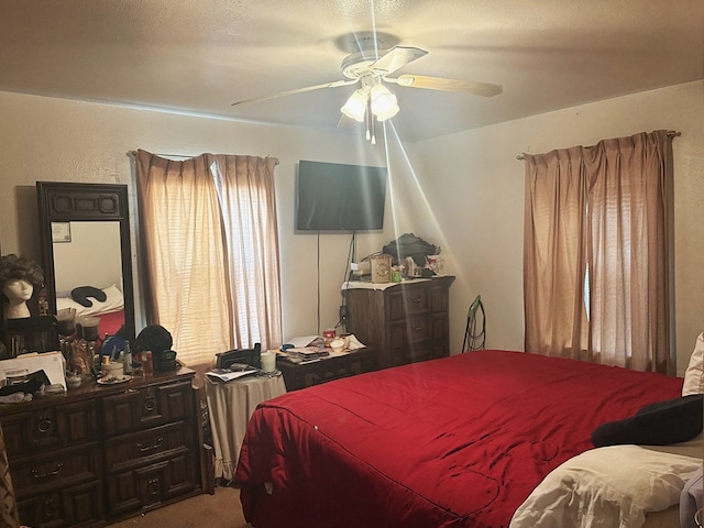 1122 E Cowden Ave, Midland, TX 79701 - bedroom featuring a ceiling fan and carpet floors