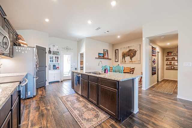 kitchen with electric range, visible vents, a sink, dishwasher, and dark wood-style flooring