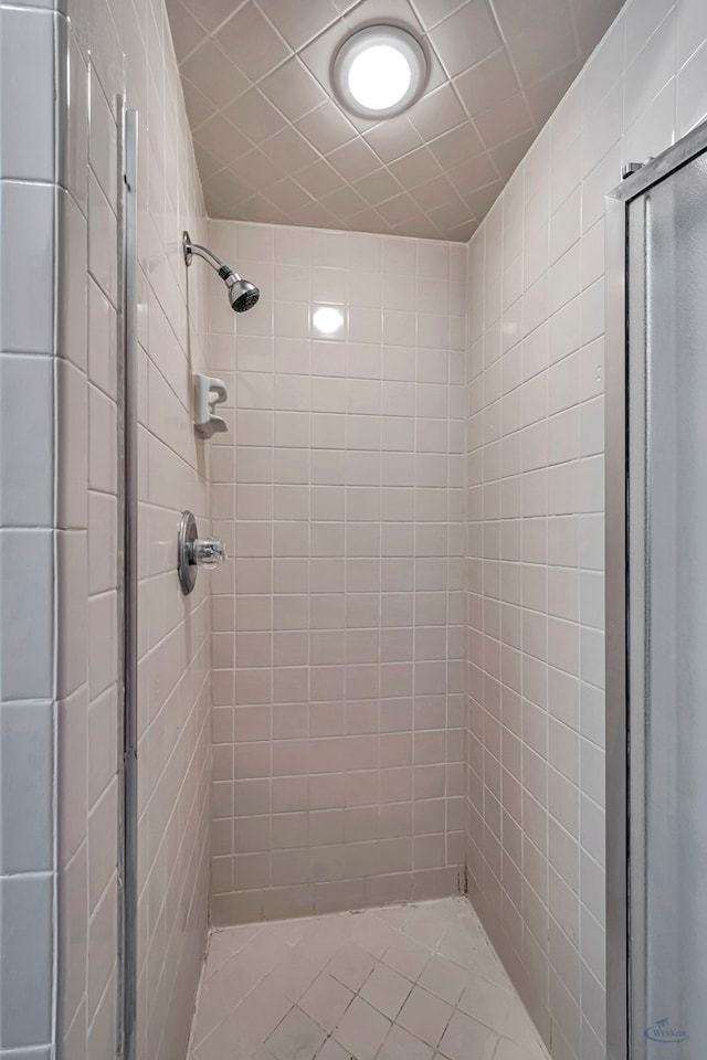 bathroom featuring a stall shower