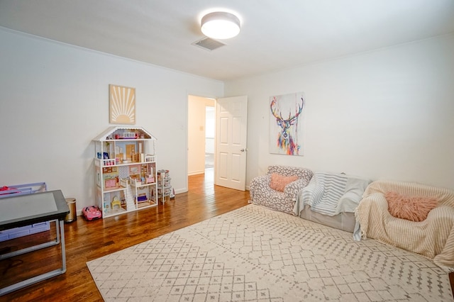 bedroom featuring wood finished floors