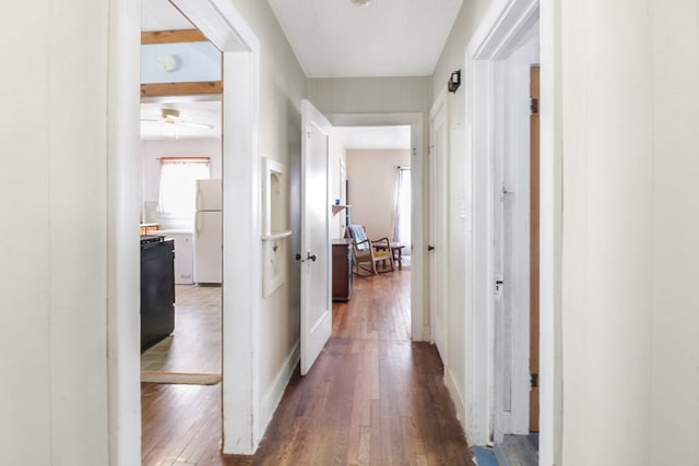 605 W Walnut St, Coleman, TX 76834 - hallway featuring dark wood finished floors
