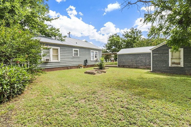 605 W Walnut St, Coleman, TX 76834 - view of green lawn with cooling unit
