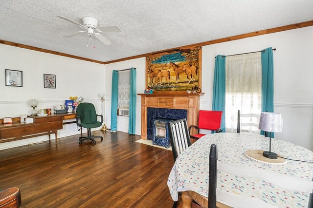 605 W Walnut St, Coleman, TX 76834 - dining space with ceiling fan, wood finished floors, crown molding, a textured ceiling, and a high end fireplace