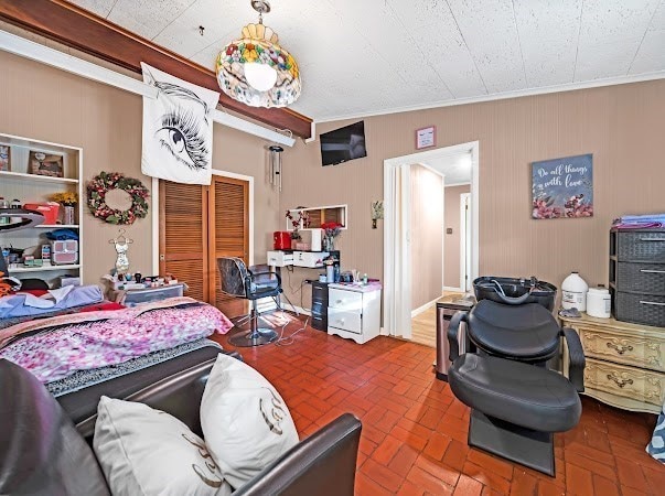 bedroom featuring ornamental molding