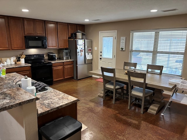 kitchen with black appliances