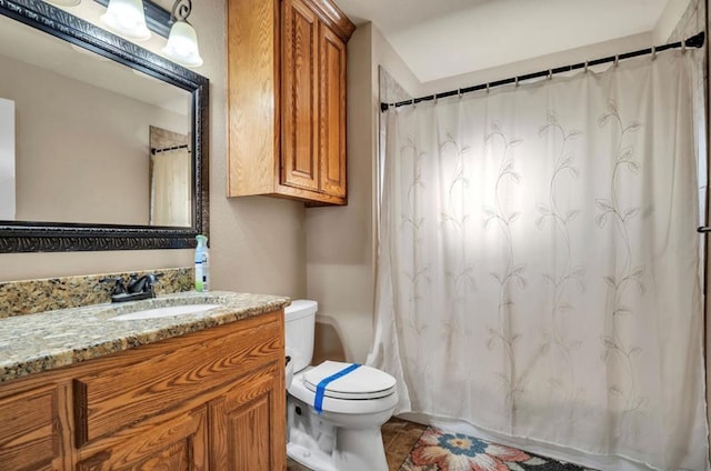 2803 S County Rd 1067, Midland, TX 79706 - full bathroom featuring a shower with curtain, toilet, and vanity