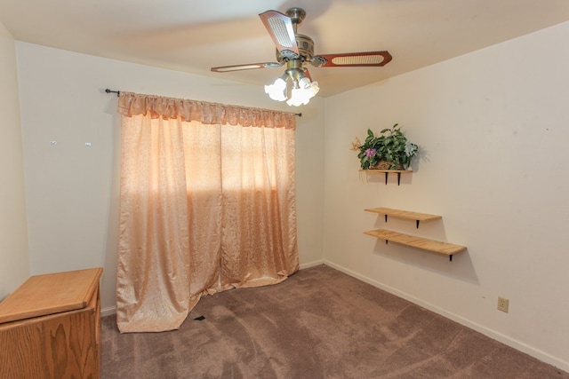 carpeted empty room with ceiling fan