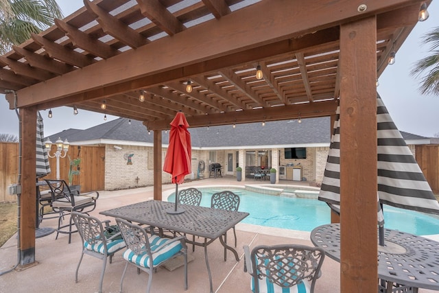 view of swimming pool featuring a patio area and a pergola