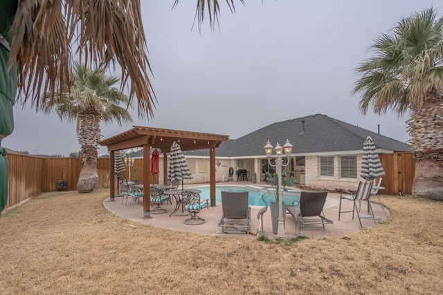 view of pool featuring a patio area and a lawn