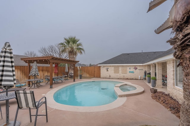 view of pool featuring a pergola, a patio area, and an in ground hot tub