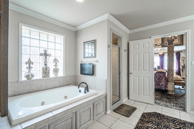 bathroom with tile patterned flooring, ornamental molding, and separate shower and tub