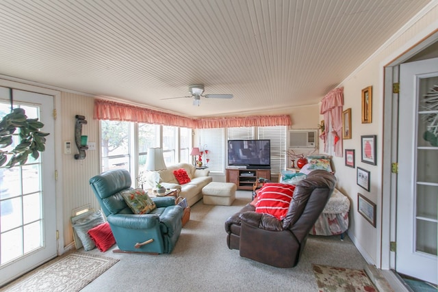 sunroom / solarium with a wall mounted air conditioner and a ceiling fan