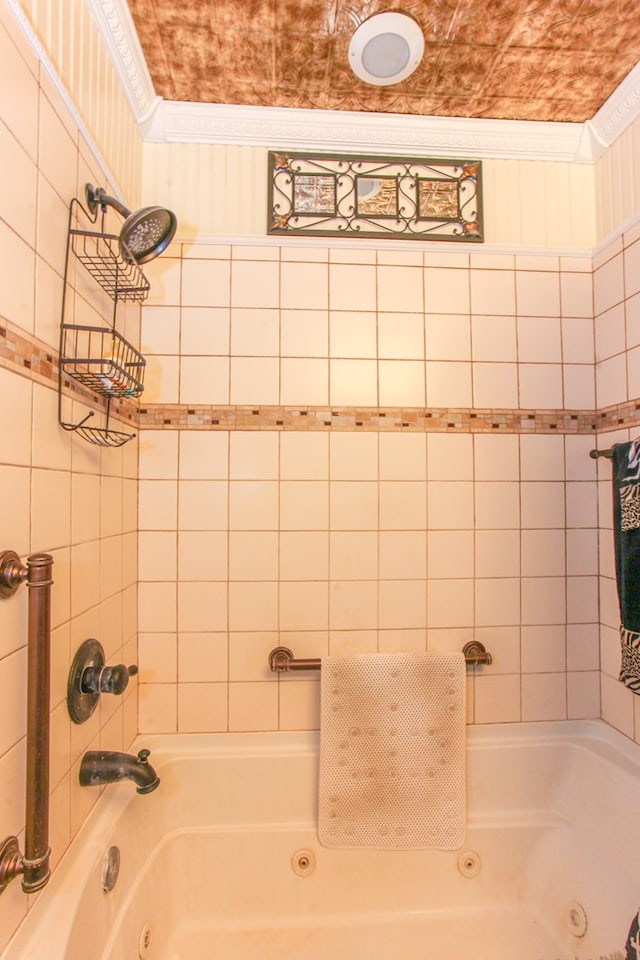 full bath featuring crown molding and a combined bath / shower with jetted tub