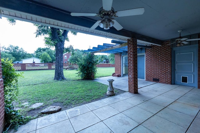 1001 W Walnut St, Coleman, TX 76834 - view of patio / terrace featuring a ceiling fan and a pergola