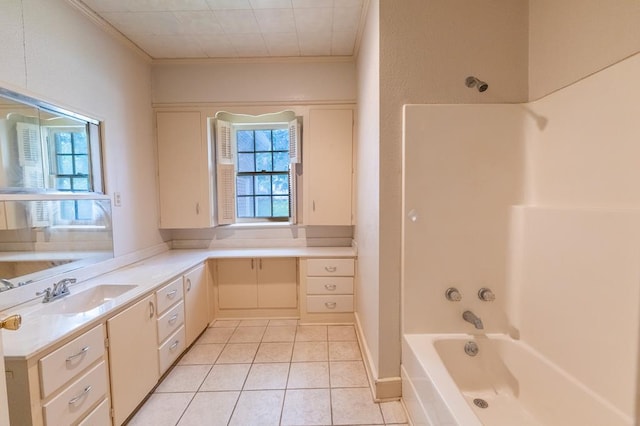 1001 W Walnut St, Coleman, TX 76834 - full bathroom with plenty of natural light, crown molding, vanity, tile patterned flooring, and shower / washtub combination