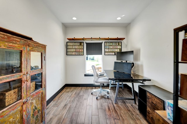 office area featuring recessed lighting, wood finished floors, and baseboards