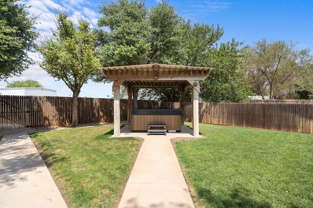 view of yard featuring a patio and a hot tub