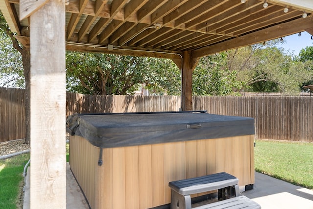 view of patio with a hot tub