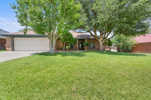 view of front facade with a front lawn and a garage