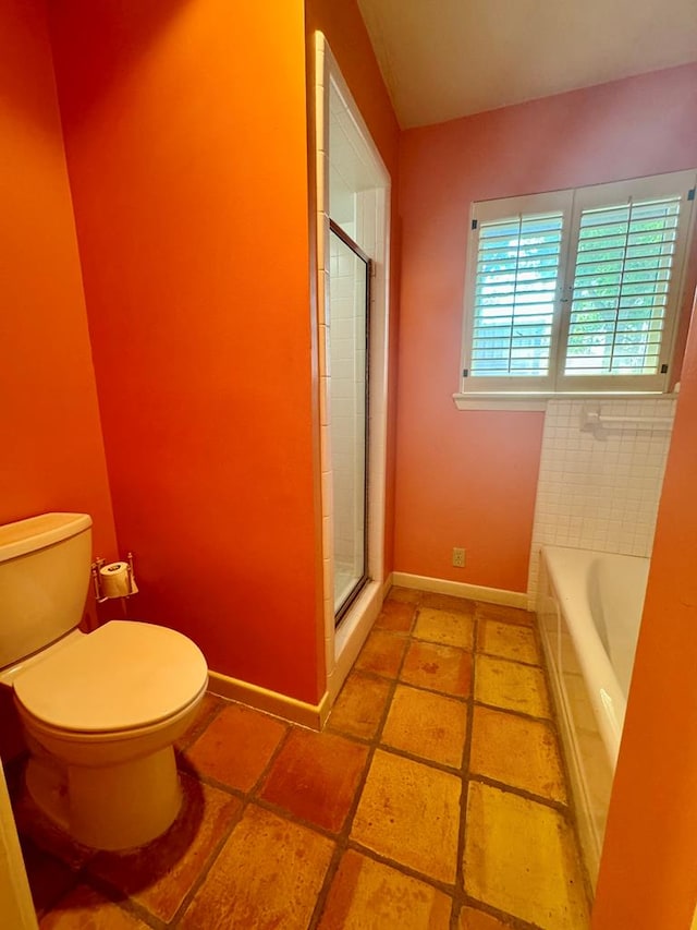 bathroom with plus walk in shower and toilet