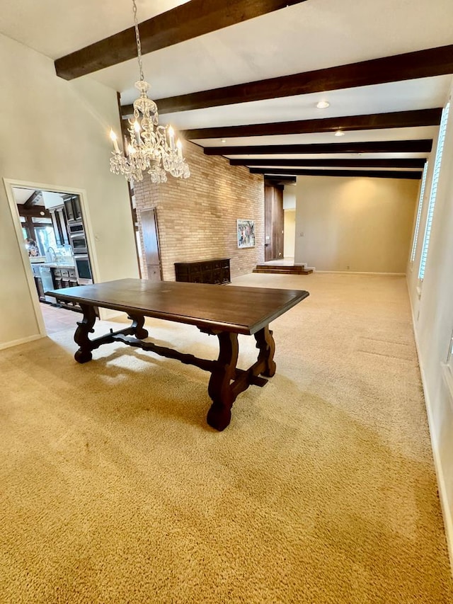 recreation room featuring carpet, beam ceiling, and an inviting chandelier