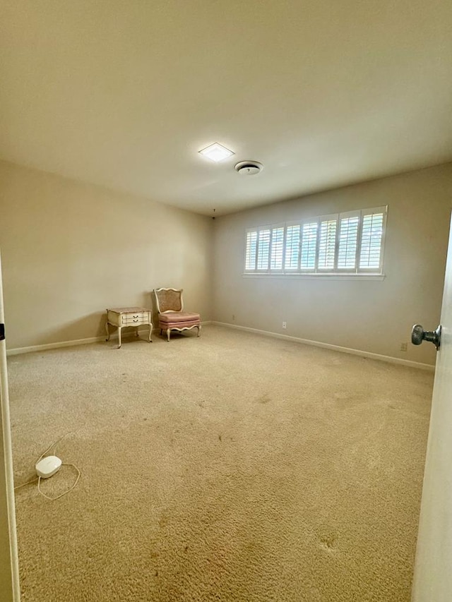 unfurnished room with carpet flooring