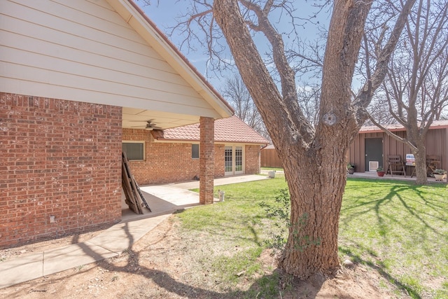 2223 S 2nd Pl, Lamesa, TX 79331 - view of yard with fence, ceiling fan, and a patio area