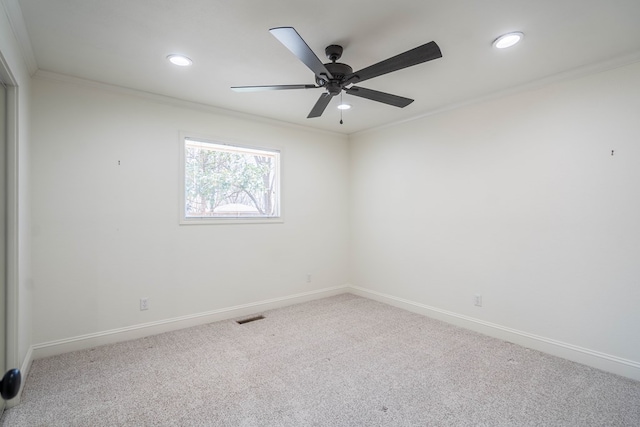 2223 S 2nd Pl, Lamesa, TX 79331 - carpeted empty room with baseboards, visible vents, and crown molding